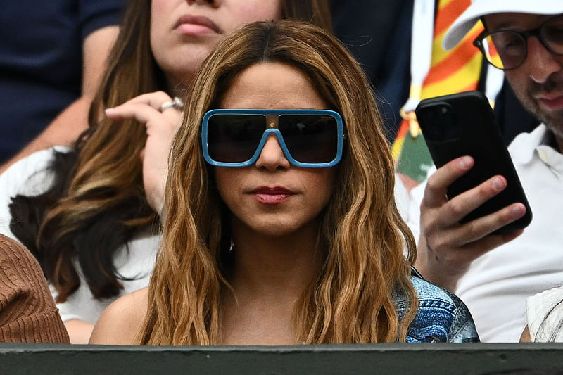 Colombian singer Shakira watches Spain's Carlos Alcaraz playing Russia's Daniil Medvedev during their men's singles semi-finals tennis match on the twelfth day of the 2023 Wimbledon Championships at The All England Lawn Tennis Club in Wimbledon, southwest London, on 14 July, 2023.