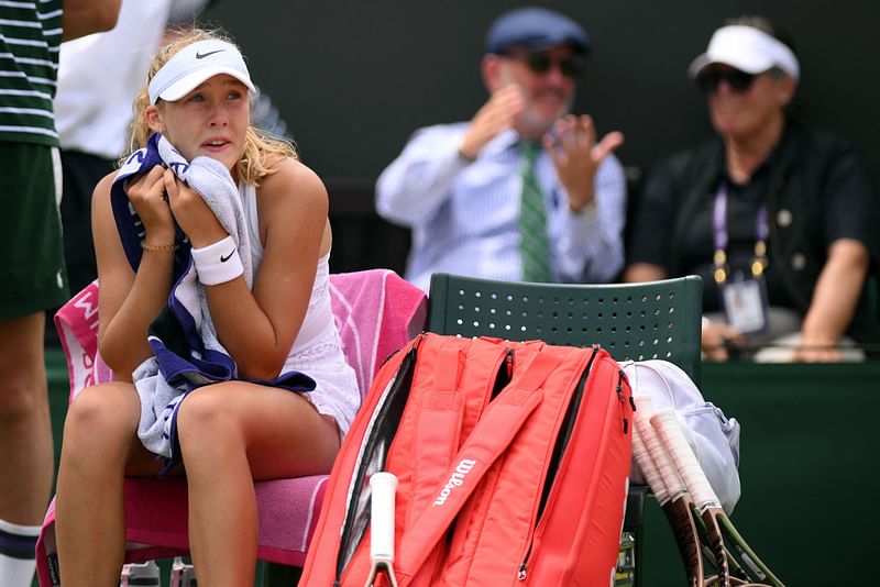 Russia's Mirra Andreeva reacts during a break in play against US player Madison Keys during their women's singles tennis match on the eighth day of the 2023 Wimbledon Championships at The All England Tennis Club in Wimbledon, London on 10 July 2023