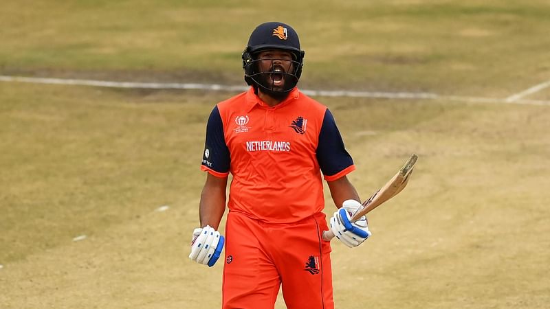 Canada's Vikramjit Singh celebrates after scoring a hundred against Oman in the ICC World Cup Qualifiers match in Harare, Zimbabwe on 3 July 2023