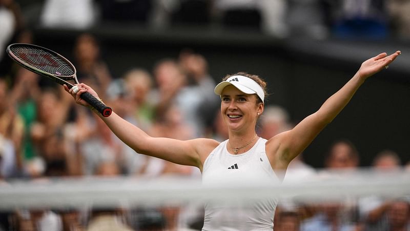 Ukraine's Elina Svitolina celebrates winning against Poland's Iga Swiatek during their women's singles quarter-finals tennis match on the ninth day of the 2023 Wimbledon Championships at The All England Tennis Club in Wimbledon, southwest London, on 11 July, 2023