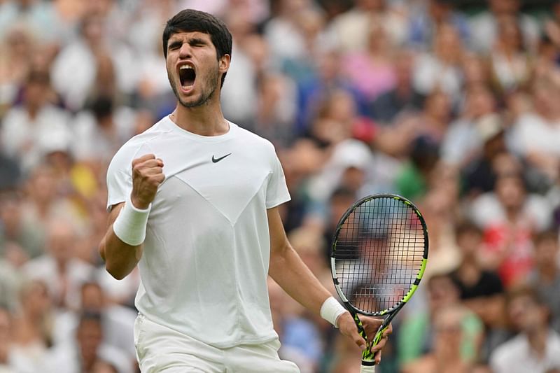 Spain's Carlos Alcaraz reacts as he plays Chile's Nicolas Jarry during their men's singles tennis match on the sixth day of the 2023 Wimbledon Championships at The All England Tennis Club in Wimbledon, London on 8 July 2023