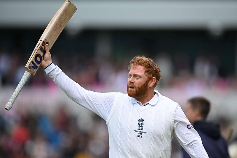 England's Jonny Bairstow raises his bat to the crowd as he leaves the field unbeaten on 99 on day three of the fourth Ashes Test between England and Australia at Old Trafford cricket ground in Manchester, England on 21 July 2023