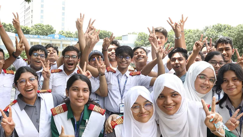 Students of Rajuk Uttara Mdoel College celebrate at their campus in Dhaka after the results of the SSC and Equivalent exams are published on 28 July 2023