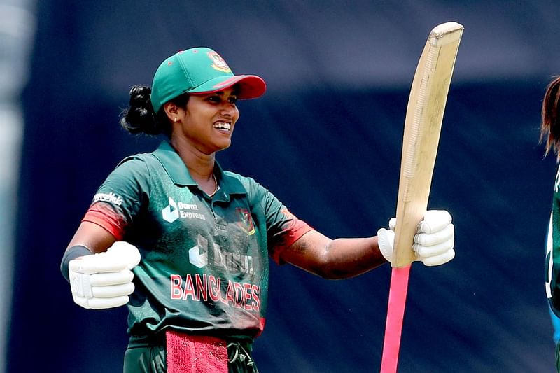 Bangladesh's Fargana Haque celebrates after scoring her maiden ODI century during the third ODI match against India at the Sher-e-Bangla National Stadium on Saturday