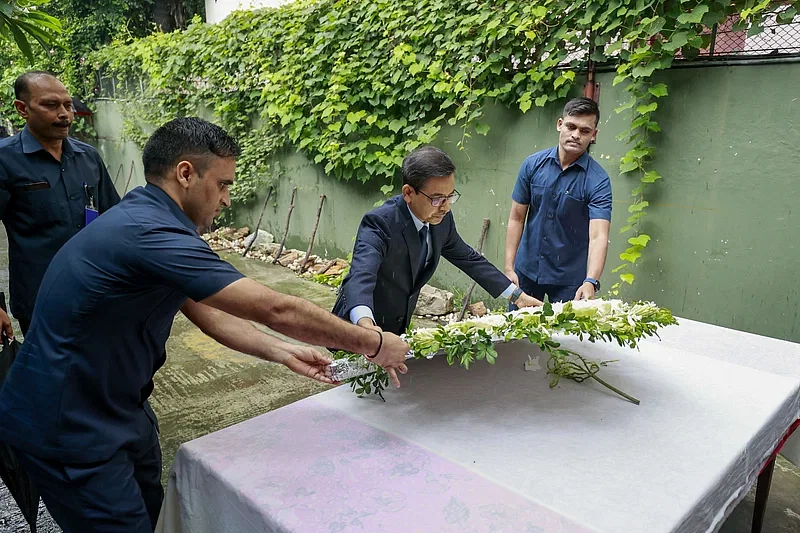 Indian high commissioner Pranay Kumar Verma pays homage to the victims of Holey Artisan attack on the seventh anniversary of the incident.