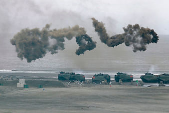 Taiwan's military holds drills of the annual Han Kuang military exercises that simulate an anti-landing operations near the coast in New Taipei City, northern Taiwan, Thursday, July 27, 2023