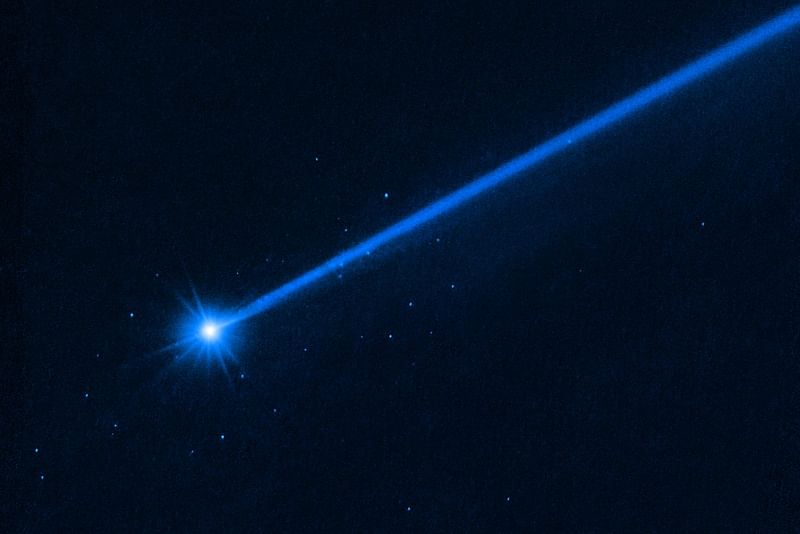 This handout photograph taken on 19 December, 2022, by Hubble Space Telescope, shows an image of the asteroid Dimorphos, nearly four months after the asteroid was impacted by NASA’s DART mission (Double Asteroid Redirection Test). When a NASA spacecraft deliberately slammed into an asteroid last year, it sent dozens of boulders skittering into space, images from the Hubble telescope showed on 20 July, 2023. The images could indicate that possible future missions to divert asteroids heading Earth's way could also spray off boulders, scientists warned.