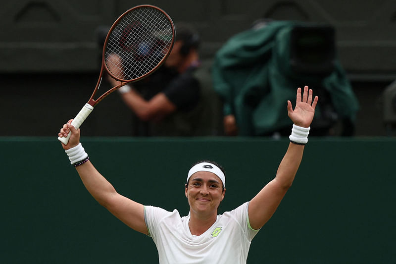 Tunisia's Ons Jabeur celebrates beating Belarus' Aryna Sabalenka during their women's singles semi-finals tennis match on the eleventh day of the 2023 Wimbledon Championships at The All England Lawn Tennis Club in Wimbledon, southwest London, on 13 July, 2023