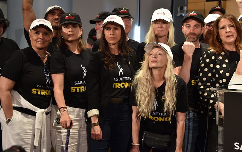 Actress Shari Belafonte (L), Frances Fisher (3R), SAG-AFTRA secretary-treasurer US actress Joely Fisher (R) attend a press conference at SAG-AFTRA's headquarters in Los Angeles, California, on 13 July, 2023