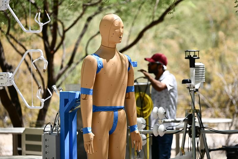 Researchers monitor a heat and wind experiment with ANDI, an Advanced Newton Dynamic Instrument, at Arizona State University (ASU) during a record heat wave in Phoenix, Arizona, on 20 July, 2023