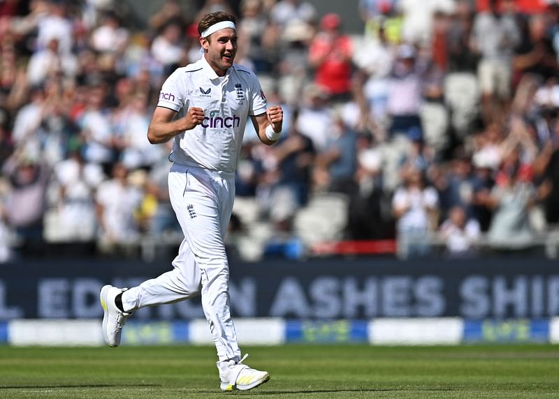 England's Stuart Broad celebrates after taking his 600th wicket, that off Australia's Travis Head, caught by England's Joe Root on the opening day of the fourth Ashes cricket Test match between England and Australia at Old Trafford cricket ground in Manchester, north-west England on 19 July, 2023