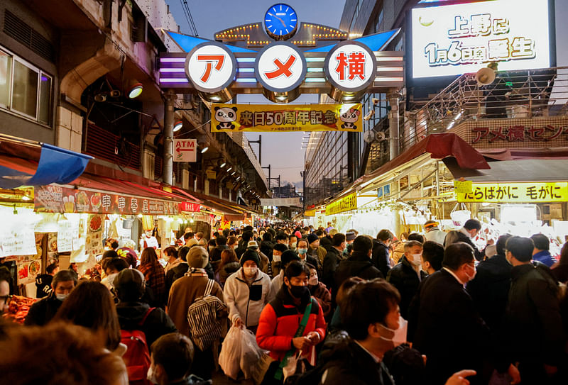 Shoppers crowd at the Ameyoko shopping district, which is Tokyo's biggest street food market, as they do their last-minute New Year's shopping in Tokyo, Japan December 29, 2022