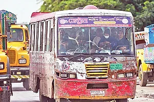 An old, weary bus operating in the capital