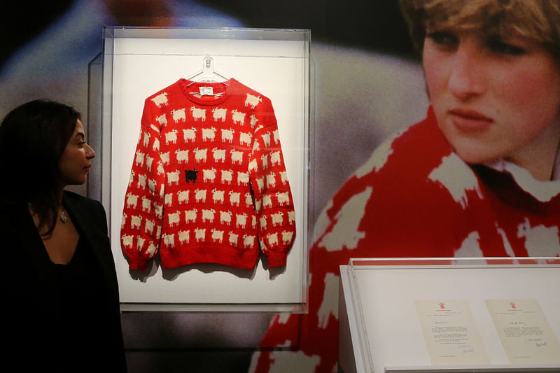 A 'black sheep' jumper worn by the Britain's late Diana, Princess of Wales, is displayed at Sotheby's, in London, Britain, 17 July, 2023. The jumper, which is to go up for auction, was worn by Diana on several occasions, and was recently rediscovered in a box in the attic of the manufacturers along with correspondence from Diana's private secretary.