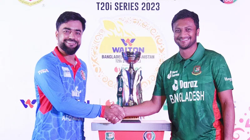 Bangladesh T20 captain Shakib Al Hasan and his Afghan counterpart Rashid Khan shake hands in the trophy unveiling ceremony ahead of the two-match Twenty20 series in Sylhet on 13 July 203