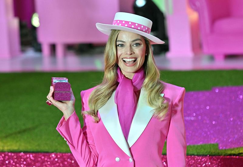 Australian actress Margot Robbie poses for a photo during a pink carpet event to promote her new film 'Barbie' in Seoul on 2 July, 2023. Vietnam has banned the upcoming 'Barbie' movie from cinemas over scenes featuring a map of the South China Sea showing Beijing's claims in the flashpoint waters, state media reported 3 July.