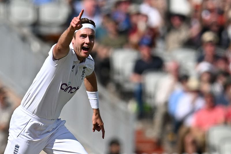 England's Stuart Broad celebrates after taking his 600th wicket, that off Australia's Travis Head, caught by England's Joe Root on the opening day of the fourth Ashes cricket Test match between England and Australia at Old Trafford cricket ground in Manchester, north-west England on 19 July, 2023