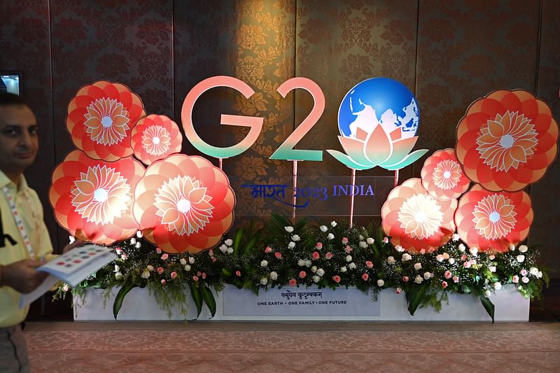 A man walks through the venue of G20 environment and climate sustainability working group meeting in Chennai on 27 July, 2023