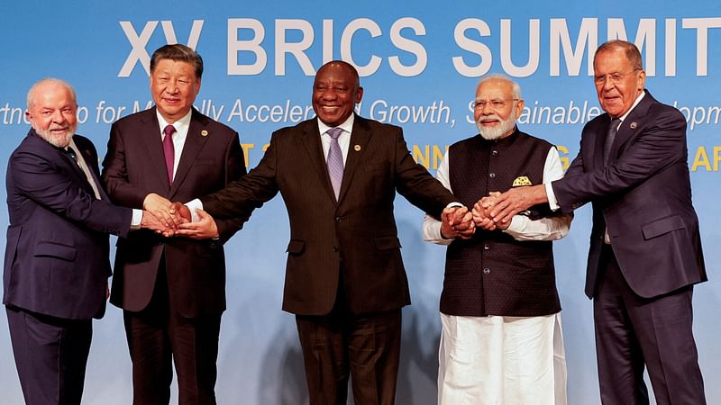 President of Brazil Luiz Inacio Lula da Silva, President of China Xi Jinping, South African President Cyril Ramaphosa, Prime Minister of India Narendra Modi and Russia's Foreign Minister Sergei Lavrov pose for a BRICS family photo during the 2023 BRICS Summit at the Sandton Convention Centre in Johannesburg, South Africa, on 23 August, 2023