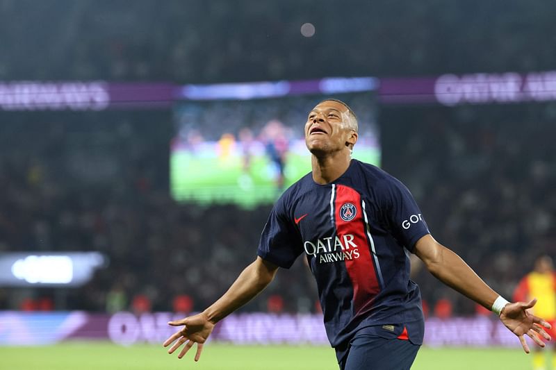 Paris Saint-Germain's French forward Kylian Mbappe celebrates scoring Paris Saint-Germain's second goal during the Ligue-1 match between Paris Saint-Germain and RC Lens at the Parc des Princes Stadium in Paris on 26 August 2023