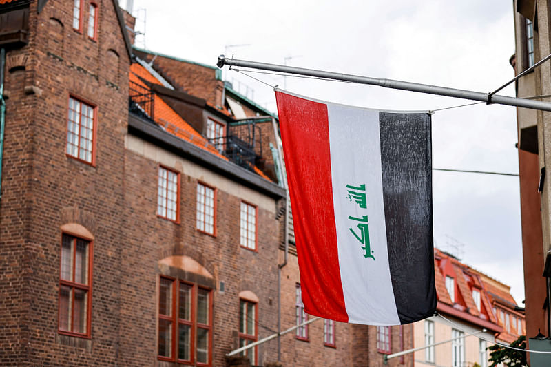 An Iraqi national flag is seen near Iraqi embassy ahead of a demonstration in Stockholm, Sweden July 20, 2023