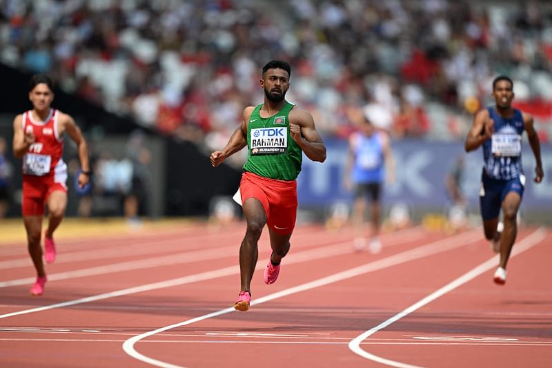 Bangladesh's Imranur Rahman crosses the finish line in the men's 100m preliminary round during the World Athletics Championships at the National Athletics Centre in Budapest on 19 August 2023