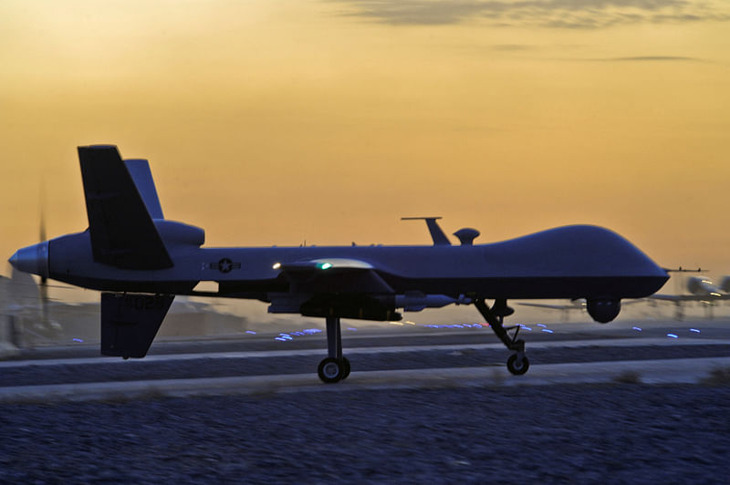 A MQ-9 Reaper drone taxis at Kandahar Airfield, Afghanistan in this December 27, 2009 photo