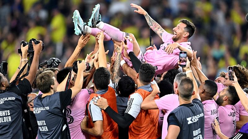 eammates hold up Inter Miami's Argentine forward #10 Lionel Messi as they celebrate after winning the Leagues Cup final football match against Nashville SC at Geodis Park in Nashville, Tennessee, on August 19, 2023