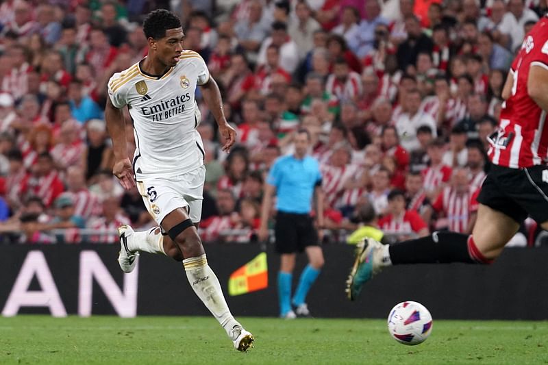 Real Madrid's English midfielder Jude Bellingham dribbles the ball during the La Liga match between Athletic Bilbao and Real Madrid at the San Mames stadium in Bilbao on 12 August 2023