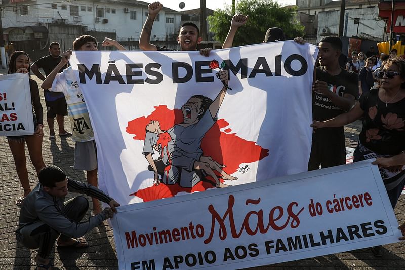 Residents protest against a police raid that killed 14 people in Guaruja, some 90 km from Sao Paulo, Brazil, on 2 August, 2023