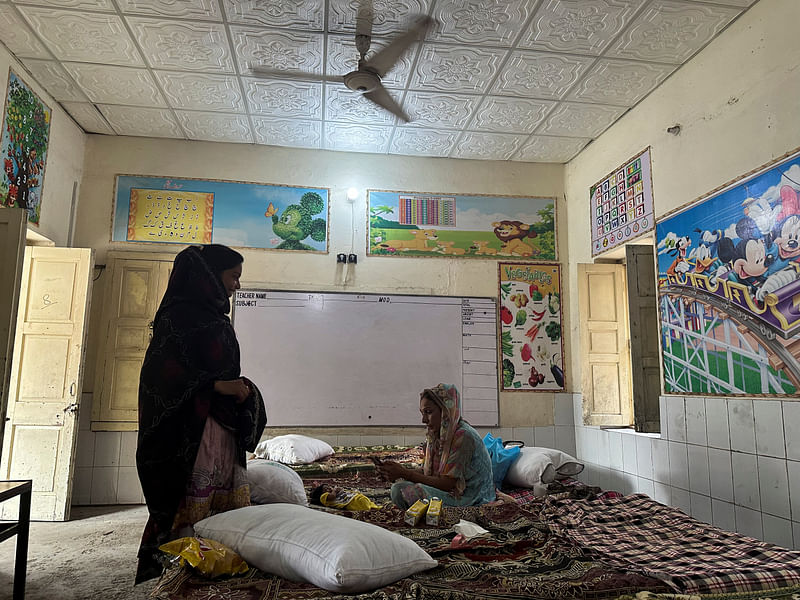 Members of Pakistan's Christian community, who were displaced after sectarian violence take refuge in a school set up as a temporary shelter, in Jaranwala town of Faisalabad, Pakistan, August 21, 2023