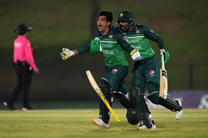 Pakistan's Naseem Shah and Haris Rauf celebrate after Pakistan won by one wicket during the second ODI between Pakistan and Afghanistan at the Mahinda Rajapaksa International Cricket Stadium in Hambantota on 24 August 2023