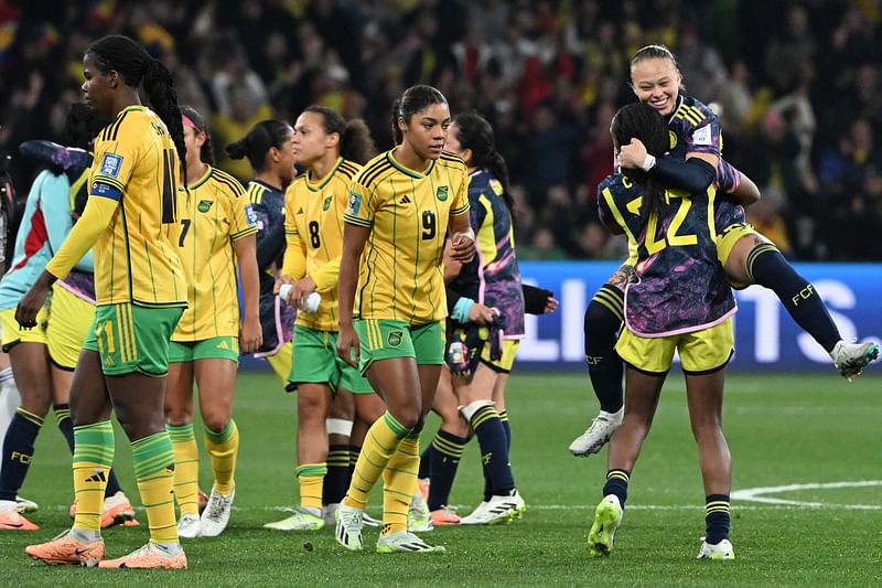 Colombia's defender Ana Guzman and Colombia's defender Daniela Caracas celebrate at the end of the Australia and New Zealand 2023 Women's World Cup round of 16 match between Jamaica and Colombia at Melbourne Rectangular Stadium, also known as AAMI Park, in Melbourne on 8 August 2023