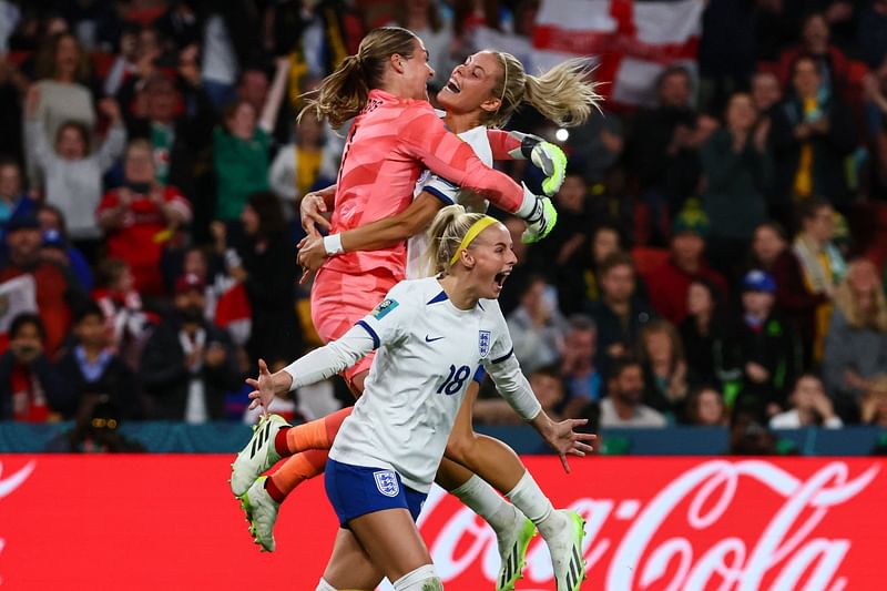 England's players celebrate their victory after a penalty shoot-out during the Australia and New Zealand 2023 Women's World Cup round of 16 match between England and Nigeria at Brisbane Stadium in Brisbane on 7 August 2023