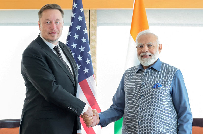 India's Prime Minister Narendra Modi shakes hand with Tesla chief executive Elon Musk during their meeting in New York City, New York, U.S., June 20, 2023