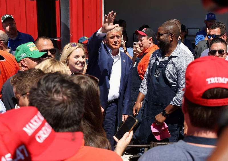 Republican presidential candidate and former U.S. President Donald Trump campaigns at the Iowa State Fair in Des Moines, Iowa, US, on 12 August, 2023.