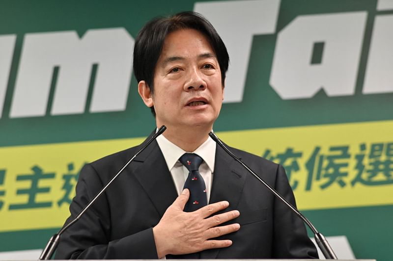 Taiwan Vice President and Chairman of ruling Democratic Progressive Party (DPP) William Lai gestures during his speech at the DPP headquarters in Taipei on April 12, 2023