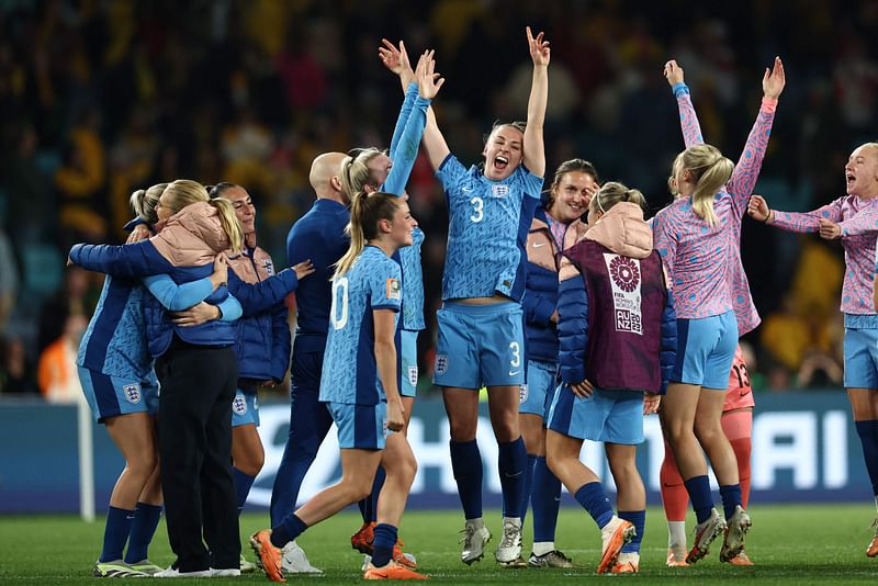 England's players react after winning the Australia and New Zealand 2023 Women's World Cup semi-final football match between Australia and England at Stadium Australia in Sydney on 16 August 2023.