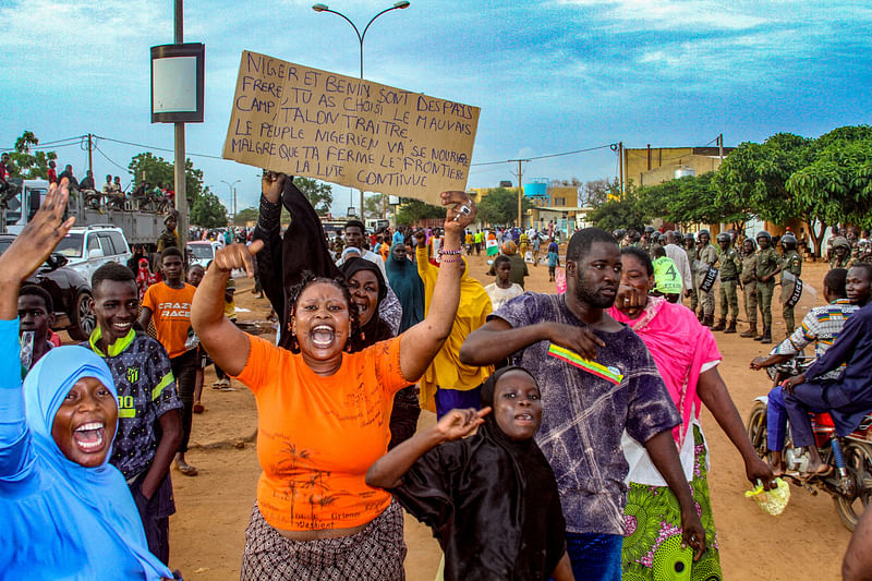 Niger's junta supporters take part in a demonstration in front of a French army base in Niamey, Niger, August 11, 2023