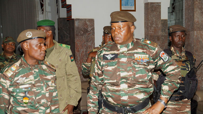 General Abdourahmane Tiani, who was declared as the new head of state of Niger by leaders of a coup, arrives to meet with ministers in Niamey, Niger July 28, 2023