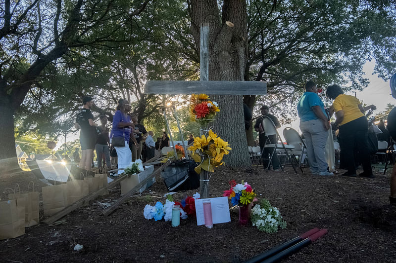 Mourners attend a prayer vigil a day after a white man armed with a high-powered rifle and a handgun killed three Black people at a Dollar General store before shooting himself, in what local law enforcement described as a racially motivated crime in Jacksonville, Florida, U.S. August 27, 2023