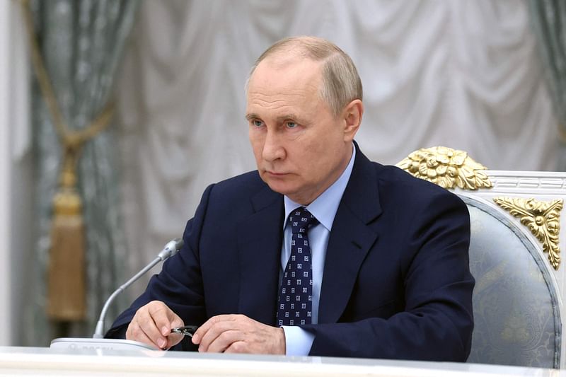 In this pool image distributed by Sputnik agency, Russia's President Vladimir Putin chairs a State Council meeting on public transport development in Moscow's Kremlin, on 17 August, 2023