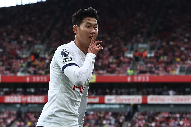 Tottenham Hotspur's South Korean striker Son Heung-Min celebrates after scoring their first goal during the English Premier League match between Arsenal and Tottenham Hotspur at the Emirates Stadium in London on 24 September 2023