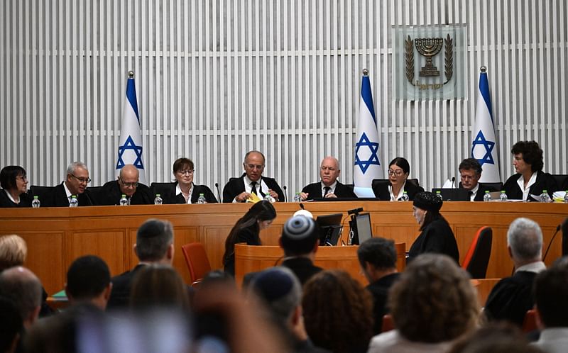 President of the Israeli Supreme Court Esther Hayut and all fifteen judges assemble to hear petitions against the 'reasonableness clause' at the court premises in Jerusalem, on 12 September, 2023