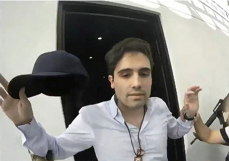 Grab from a handout video released by the Mexican Government's CEPROPIE on 30 October, 2019, showing the moment of the arrest of alleged trafficker Ovidio Guzman, son of jailed drug kingpin Joaquin Chapo Guzman