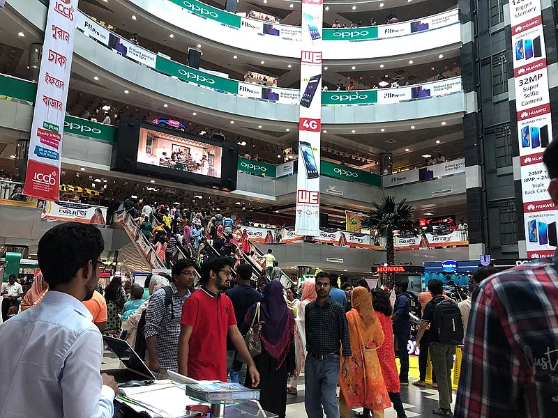 People at a shopping mall in Dhaka