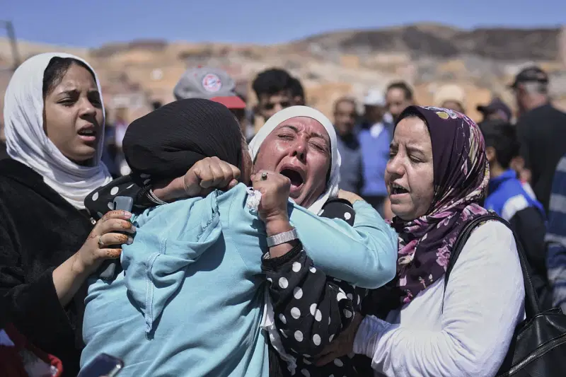 Women cry as they mourn victims of the earthquake in Moulay Brahim in the province of Al Haouz, Morocco, Sunday Sept. 10, 2023. An aftershock rattled Moroccans on Sunday as they prayed for victims of the nation’s strongest earthquake in more than a century and toiled to rescue survivors while soldiers and workers brought water and supplies to desperate mountain villages in ruins.