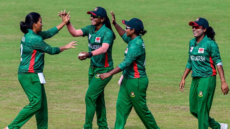 Bangladesh's Marufa Akter celebrates with teammates after the dismissal of Pakistan's Sidra Ameen during the 2022 Asian Games women’s third-place playoff match between Bangladesh and Pakistan in Hangzhou in China's eastern Zhejiang province on 25 September 2023