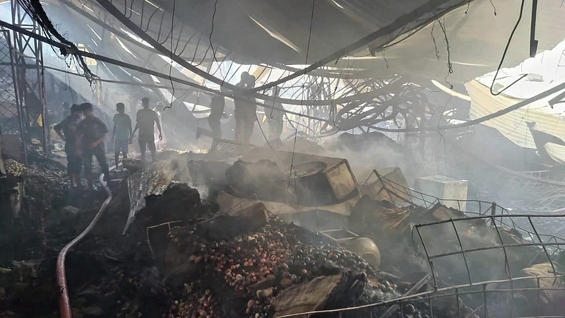 Aftermath of a fire at Mohammadpur Krishi Market in Dhaka on 14 September, 2023