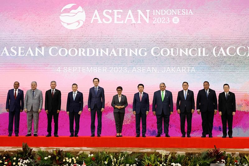 Foreign ministers of Malaysia, Philippines, Singapore, Indonesia, Laos, Brunei, Cambodia and East Timor, Thailand's permanent secretary of the foreign ministry, Vietnam's deputy foreign minister, and ASEAN secretary general Kao Kim Hourn pose for a group photo during the 34th ASEAN Coordinating Council meeting in Jakarta on 4 September, 2023